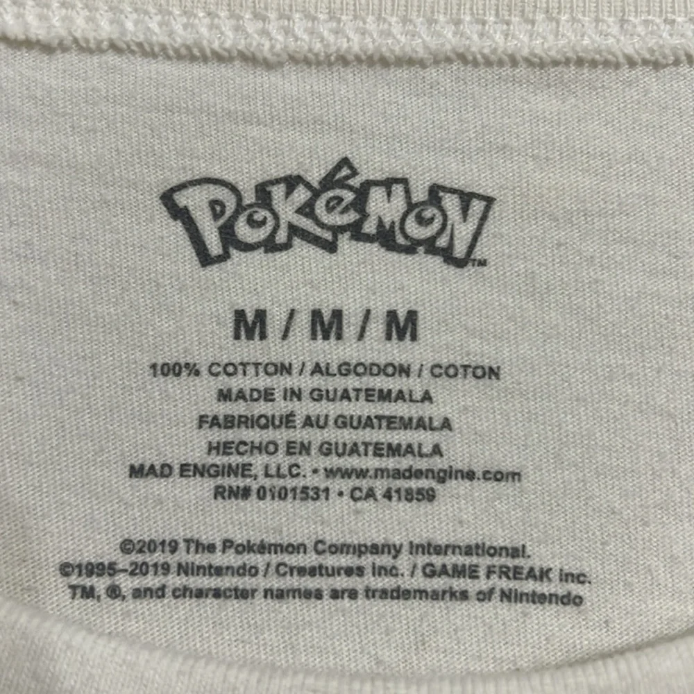 Off white, long sleeve pikachu shirt. Size Medium - Picture 3 of 4